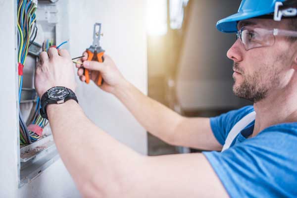 What sort of work does an electrician carry out for a property?