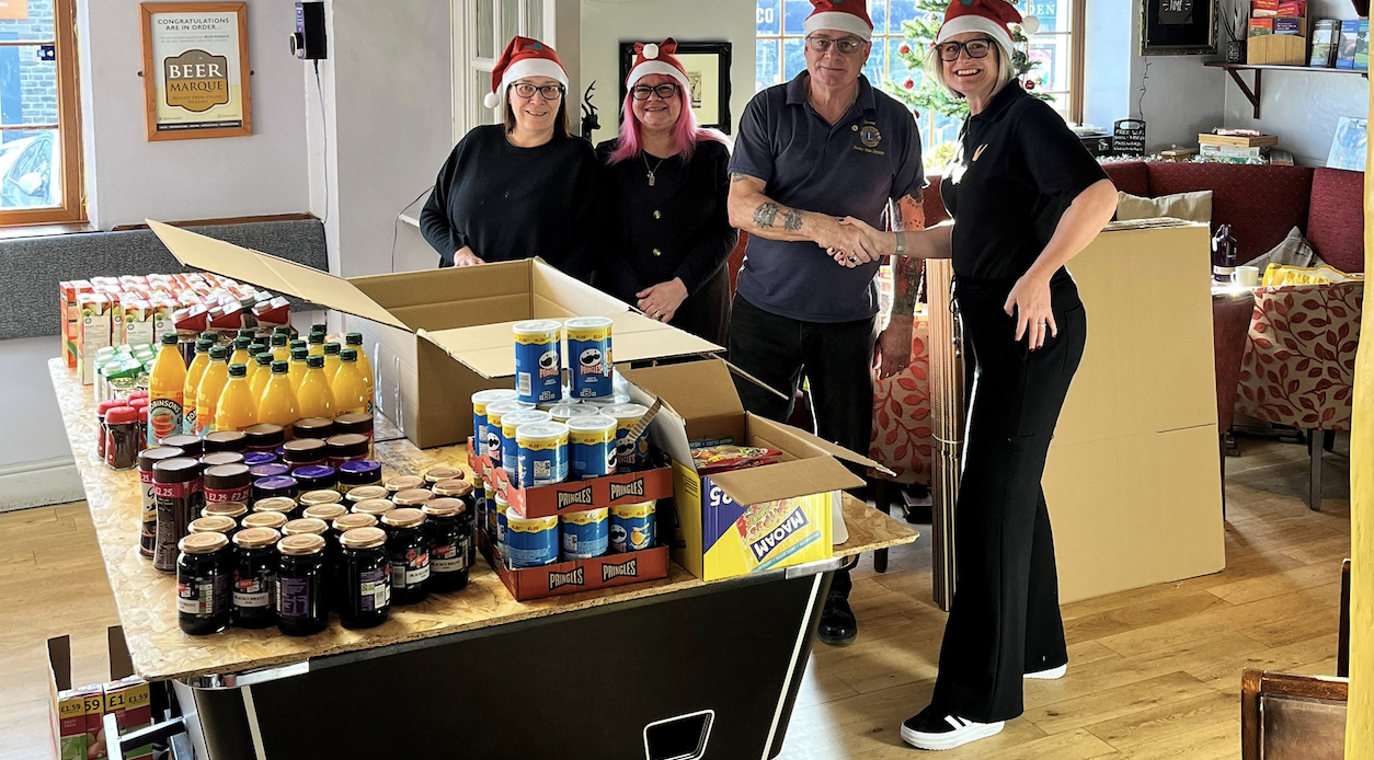 Vivly Living donates £1,000 to Huddersfield community food bank