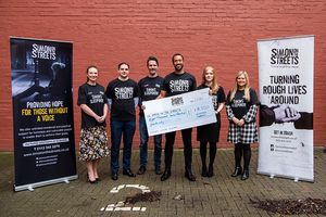 Law firm raises over £8,000 for local homelessness charity