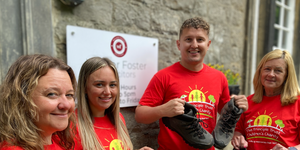 Solicitors swap suits for boots in anniversary walk